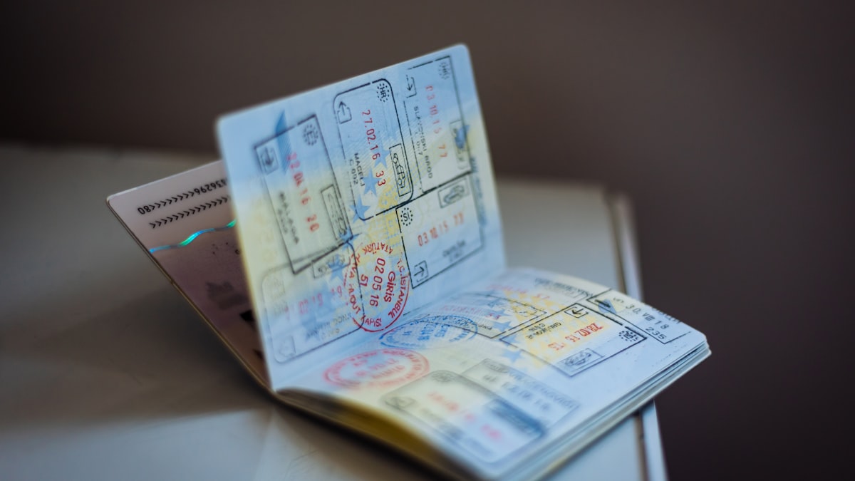 UAE passport and visa documents on a desk