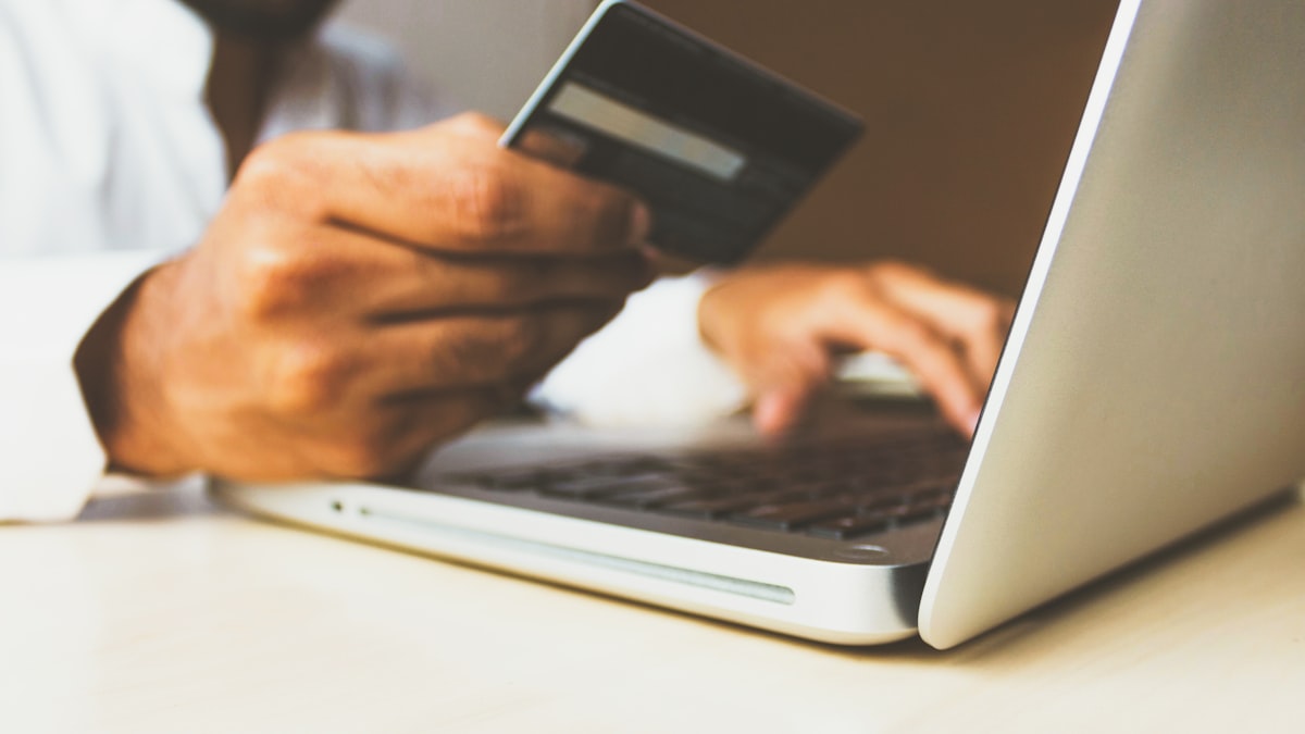 Person shopping online during a festive sale